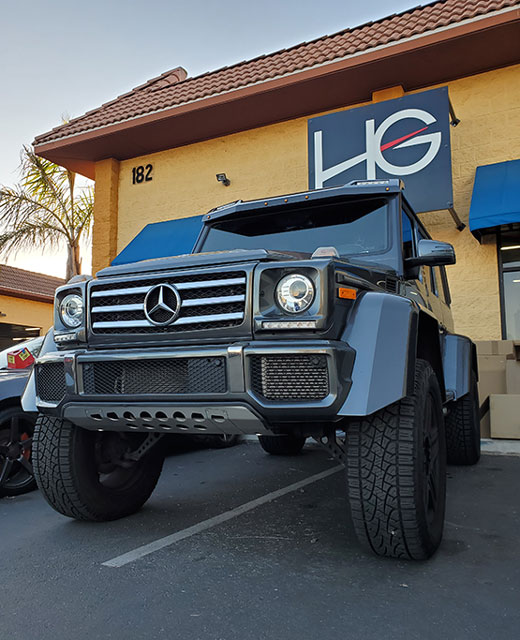 Dark grey Mercedes parked at HG Performance