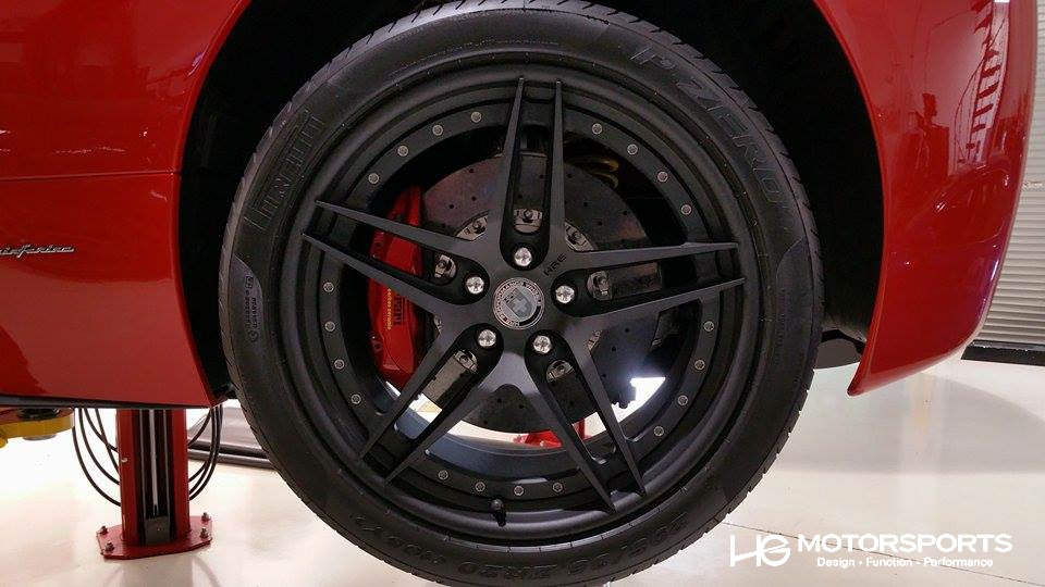 Ferrari 458 Spider with textured black mirror accents and HRE wheels